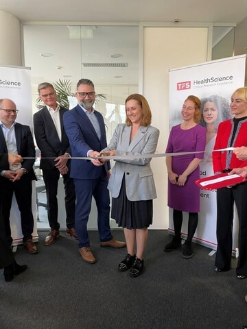 TFS HealthScience team opens new office in Portugal with ribbon cutting.