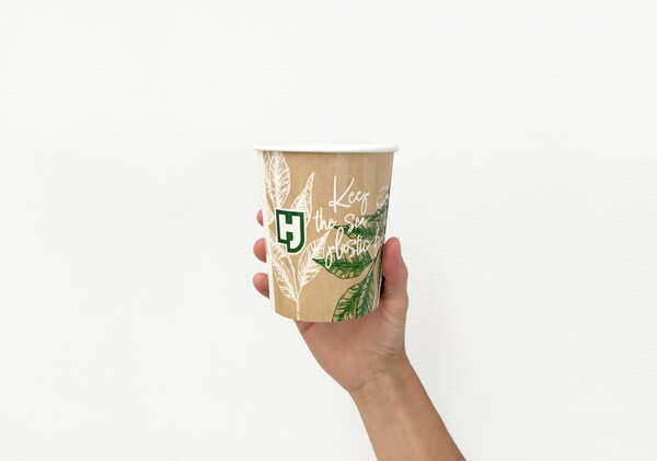A hand holding a cup representing Hinojosa Packaging Group's new FoodService Line Packages. 