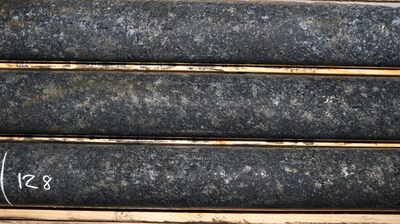 Photo 1: Typical ‘West Graham-style’ mineralization from hole WG-23-026. Core is NQ diameter measuring 47.6 millimetres. Photo is from a depth of 128 metres. (CNW Group/SPC Nickel Corp.)