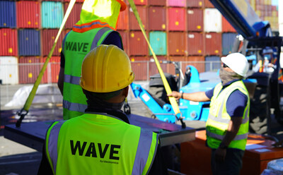 A team installs a WAVE charging pad at the Port of Los Angeles. WAVE wireless charging is a proven technology that provides opportunity charging, extending vehicle range.