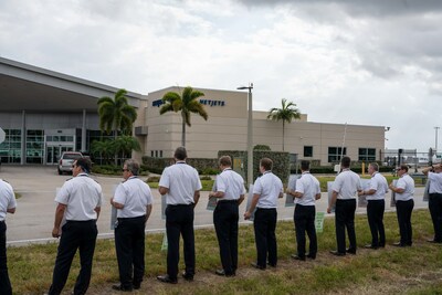 NetJets pilots decry low pay and long schedules amid an escalating labor crisis during a mid-February informational picket outside the fractional's West Palm Beach facility.
