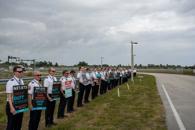 NetJets pilots participate in a mid-February informational picket outside NetJets' West Palm Beach facility.