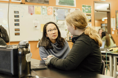 Sandra Liu Huang, head of education at the Chan Zuckerberg Initiative, engaging with Prairie Heights Middle School student.
