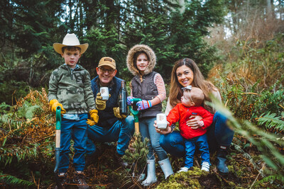 Andrew and Courtney Browne, proprietors of Browne Family Vineyards, plant trees with their children in support of the Browne Forest Project