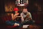 Pizza Hut Launches Limited-Edition Reversible "Hut Hat" in Partnership with Chain
