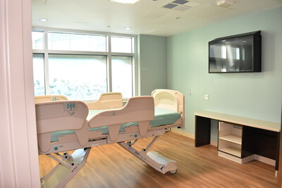 A behavioral health patient room. Note the safety feature on the television screen.
