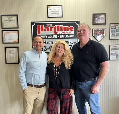 Eric Garner, President of Pye-Barker's Alarm Division, meets with Alan and Candi Hartline of The Hartline Company.