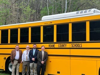 Roane County Schools taking delivery of a GreenPower BEAST all-electric purpose-built school bus. In the photo are GreenPower Motor Vice President Mark Nestlen; Jerry Garner, Director of Operations; Richard Duncan, Superintendent and Jeff Mace, Board of Education President