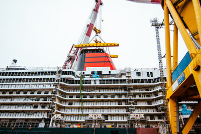 Cunard’s Newest Ship Queen Anne Receives Her Funnel on April 14, 2023, at Fincantieri Shipyard in Italy.