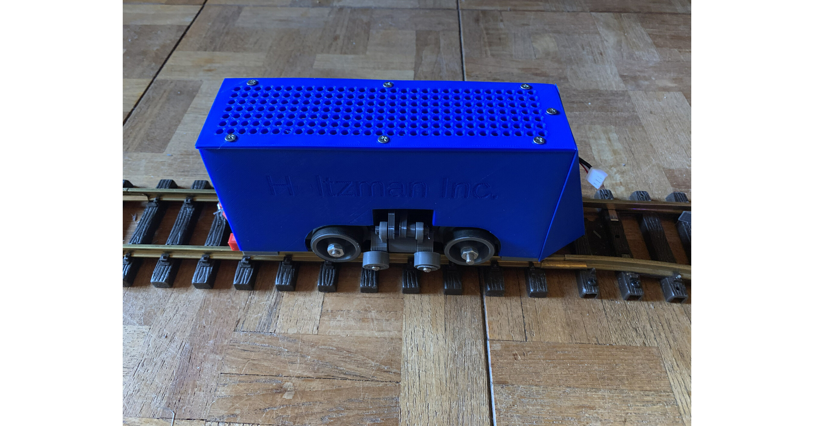 Model Train Cars with Self Steering Capabilities Navigate Their Own