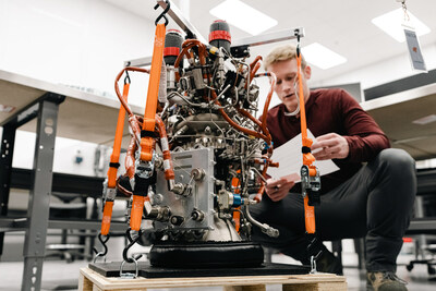 Jordan Forness, Vehicle Operations Manager at Ursa Major, reviews a Hadley engine before it ships to Astra