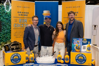 The Sunshine Punch team, winner of WSWA's 2023 Brand Battle, showcase their new brand at their exhibit booth at Access LIVE.