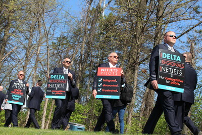 NetJets pilots picket across from the company's headquarters in Columbus on April 19, 2023.