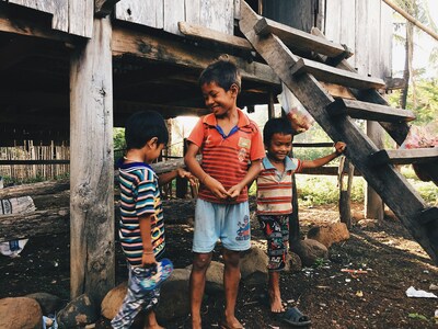 Three young children in Cambodia, one of Compassion's new expansion countries. (Photo by Joyce Lim.)