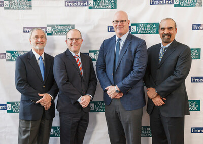 Dr. James Kelly, Dr. Michael McCrea, Joe Brennan, and Dr. Shekar Kurpad announcing the $12.5 million gift from Avalon Action Alliance to the Froedtert & Medical College of Wisconsin Neuroscience Institute for the treatment of mild Traumatic Brain Injury (mTBI or concussions) in military veterans and first responders.