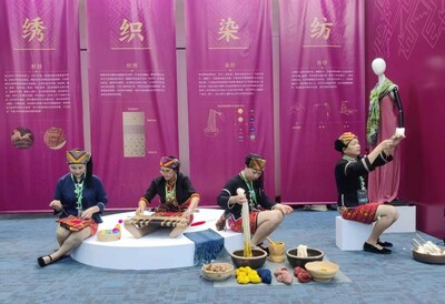 Craftswomen from Hainan Li ethnic group showing the traditional techniques of spinning, dyeing, weaving and embroidery