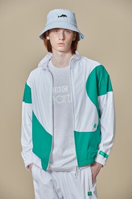 Male model wearing BBC Earth ‘Lightweight Woven Earth Pattern Windbreaker’ and ‘Lightweight Woven Jogger Pants’ (PRNewsfoto/BBC Studios)