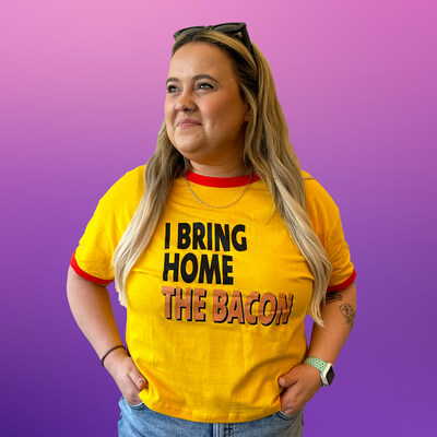 The collection includes vintage-inspired crop-tops and T-shirts for humans and their bacon-loving pups, as well as hair scrunchies, dog leashes and collars, and even a special fanny pack where dog lovers can carry packages of Beggin’ dog treats