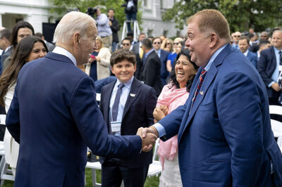 AmePower’s President Karina Doracio and CEO Luis Contreras with President Biden at the White House for National Small Business Week. Credit: POTUS/White House