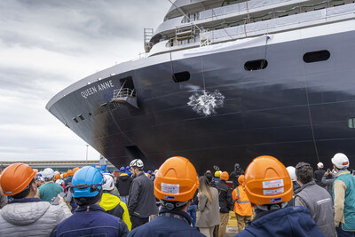 A bottle of prosecco smashes the hull of Queen Anne at the Fincantieri Marghera shipyard in Venice, Italy. (PRNewsfoto/Cunard)