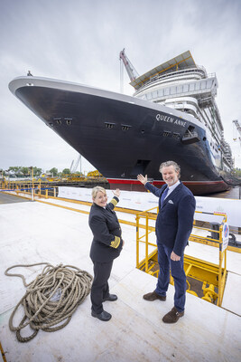 Captain Inger Klein Thorhauge and Sture Myrmell, Carnival UK President in front of Cunard’s newest ship, Queen Anne, at the Fincantieri Marghera shipyard in Venice, Italy. (PRNewsfoto/Cunard)