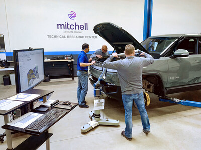 Mitchell employees collect 3D measurements and scans on the Rivian R1T at the company’s Technical Research Center in San Diego.