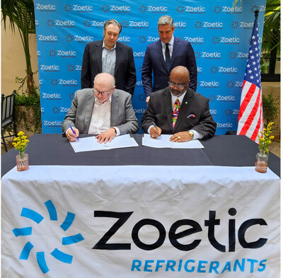 Pictured at the signing ceremony for the new Verified Credits/Zoetic partnership are: (back) Vivaris Capital President & CEO J. Christopher Mizer and Zoetic Global Chief Global Business Development Officer Tim Ryan; (front) Verified Credits Principal Steve Scholl and Zoetic Global Chairman and Co-Founder Jerome Ringo. (PRNewsfoto/Zoetic Global)