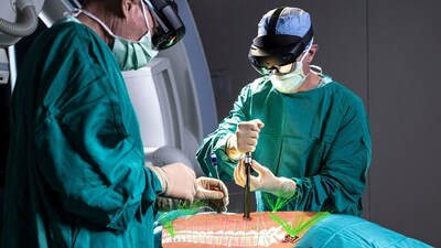 Surgeons using Novarad's VisAR augmented reality surgical navigation in stereotactic spinal surgery