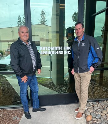 Rod DiBona, COO of Pye-Barker's sprinkler division, with Gary Peterson, President and CEO at Automatic Fire Sprinklers.