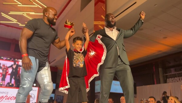 Cancer Warrior Gavin with WWE Superstars Apollo Crews and Omos