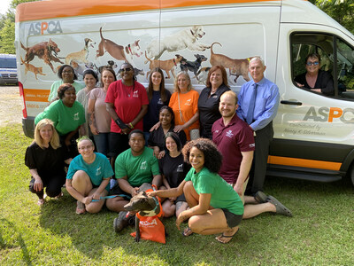 Oktibbeha County Humane Society staff and shelter dog with an ASPCA Animal Relocation transport vehicle at the groundbreaking ceremony for the new OCHS Animal Support Center by the ASPCA in Starkville, MS.