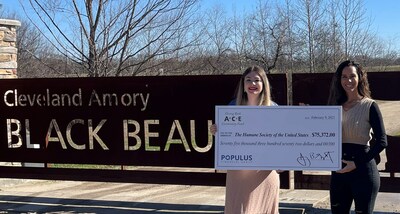Populus Financial Groups presents a $75,372 donation to Kristie Tanner, Director of Business Partnerships at the Humane Society of the United States