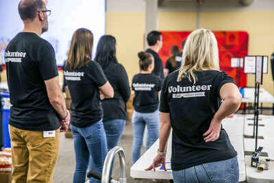 Employees at Post Consumer Brands headquarters in Lakeville, Minn., join together to assemble culturally relevant pantry packs for Latino families facing food insecurity in the Twin Cities during the company’s annual “Ingredients for Good” volunteer event. (Credit: Drew Anthony Smith/Post Consumer Brands)