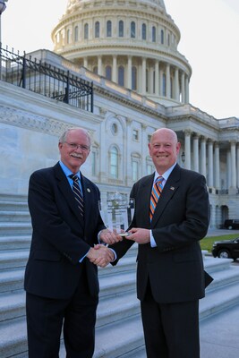 U.S. Rep. John Rutherford (R-Fla.) is given the NSSF Real Solutions Champion award by NSSF's Larry Keane in Washington, D.C.