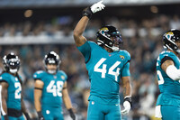 Jacksonville Jaguars linebacker Travon Walker (44) warms up during