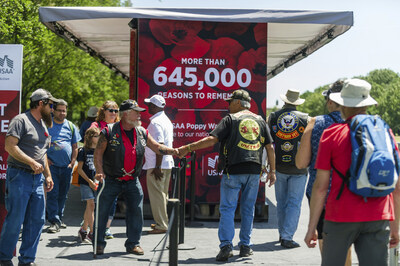 Visitors gather at the USAA Poppy Wall of Honor on the National Mall in Washington, D.C. in May 2019.