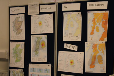 A map wall displays early maps in a disaster about the population affected, logistics, shelter and forecasted conditions, for example. Photo: MapAction