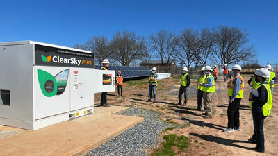 Adam Baker, Director of Product Development at Aderis Energy, showcasing the ClearSky Plus inrush mitigation solution during a site tour for portfolio managers, investors, and technicians.