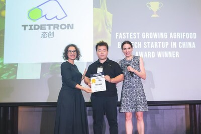 Zhang Zhiqian, the Founder and CEO of Tidetron, was presented with the Award for “Fastest Growing Agrifood Biotech Startup in China” (with Dr. Ismahane Elouafi, the Chief Scientist at the Food and Agriculture Organization to the left and Isabelle Decitre, the Founder of ID Capital to the right on stage.）