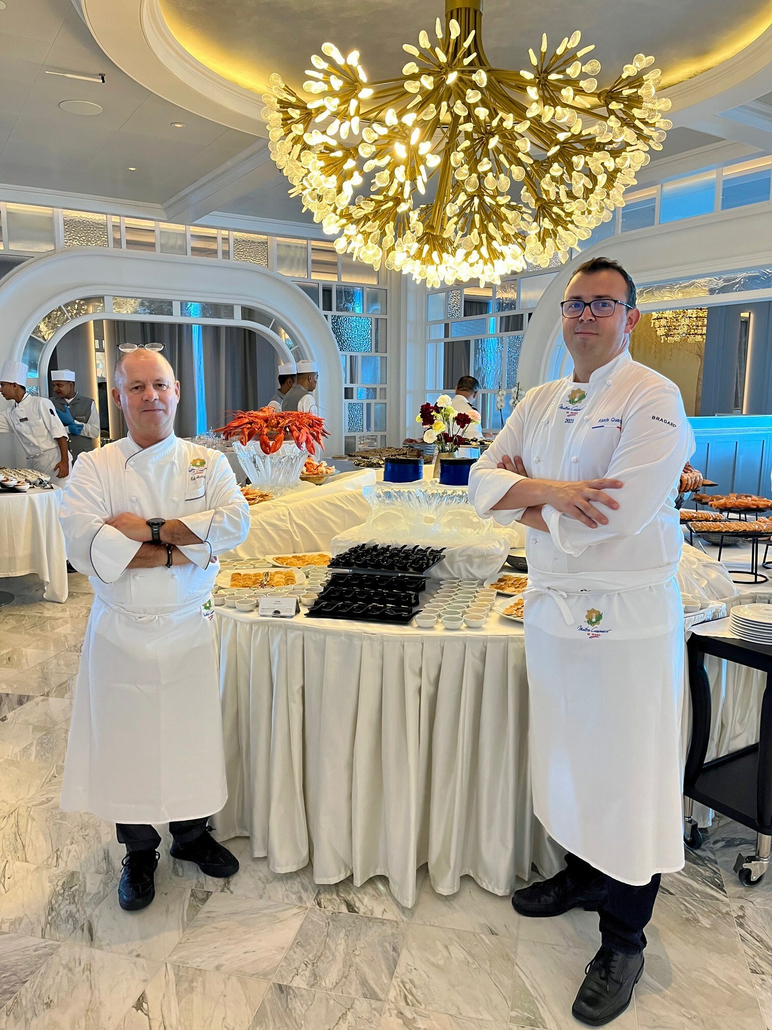 Chef Eric Barale and Chef Alexis Quaretti During Brunch Service in The Grand Dining Room on board Oceania Cruises’ newest ship, Vista (Image at LateCruiseNews.com - May 2023)