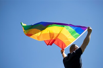 Young Man with LGBT flag