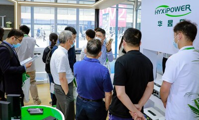 A HYXiPOWER representative demonstrates the firm's PV Inverters and energy storage