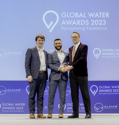 ZwitterCo's Christopher Drover, CTO & co-founder, and Alex Rappaport, CEO & co-founder, accept a Global Water Award from Christopher Gasson, owner of Global Water Intelligence Magazine and award ceremony host.