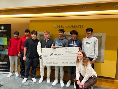 UP volunteers distribute funds for Sarcoma Bone cancer research with Fred Hutcheson Cancer Centre in Seattle Washington (March 2023) (PRNewsfoto/Unlimited Potential)