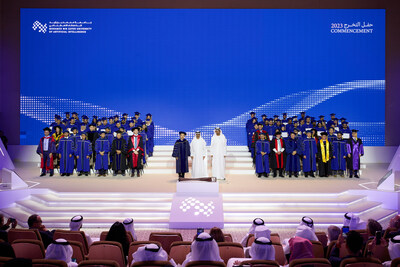 The Class of 2023 with His Highness Sheikh Hamed bin Zayed Al Nahyan (center); His Excellency Dr. Sultan bin Ahmed Al Jaber, Minister of Industry and Advanced Technology,President-Designate of COP28 UAE and Chairman of MBZUAI's Board of Trustees(right); and Professor Eric Xing, MBZUAI President and University Professor (left).