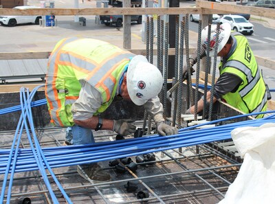 Even in the scorching Texas heat, these Rogers-O'Brien workers rest assured, as timely alerts keep them informed and protected from potential dangers.