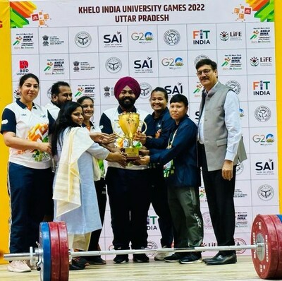 Chandigarh University Womenâ€™s team while receiving the â€˜Weightlifting Overall Trophyâ€™ at Khelo India University Games 2023