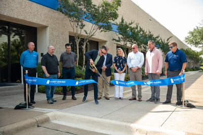 West Shore Home Founder and CEO B.J. Werzyn cuts the ribbon for the company's new western headquarters in Dallas, TX.