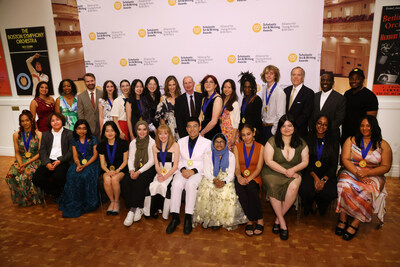 Poet Kinsale Drake, back row far left, fashion designer and Alumni Achievement Award recipient Tracy Reese, back row second left, Executive Director of the Alliance for Young Artists & Writers Christopher Wisniewski, back row third left, Chair of the Board, Executive Vice President, Chief Strategy Officer and President, Scholastic Entertainment, Iole Lucchese, back row center left, President and CEO of Scholastic Peter Warwick, back row center right, Chairman of the Board of the Alliance for Young Artists and Writers Hugh Roome, back row third right, interdisciplinary artist Derek Fordjour, back row second right, and actor Derek Luke, back row far right, pose with the Gold Medal Portfolio recipients and National Student Poets backstage at the 2023 Scholastic Art & Writing Awards National Ceremony held at Carnegie Hall, Thursday, June 8, 2023 in New York. (Photo by Jason DeCrow /AP Images for Alliance for Young Artists & Writers)