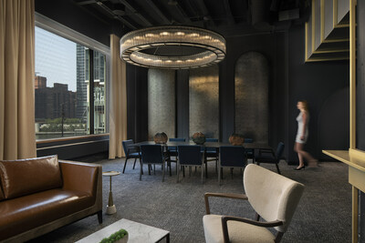 The Founder's Room, THE MART's new tenant-exclusive lounge that offers the perfect intimate space to escape the daily hustle and bustle, with stunning views of the Chicago river. Photo courtesy of Gensler/Gillian Fry and THE MART.